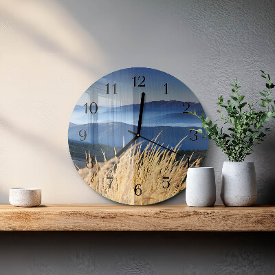 Wanduhr rund Berge Gras