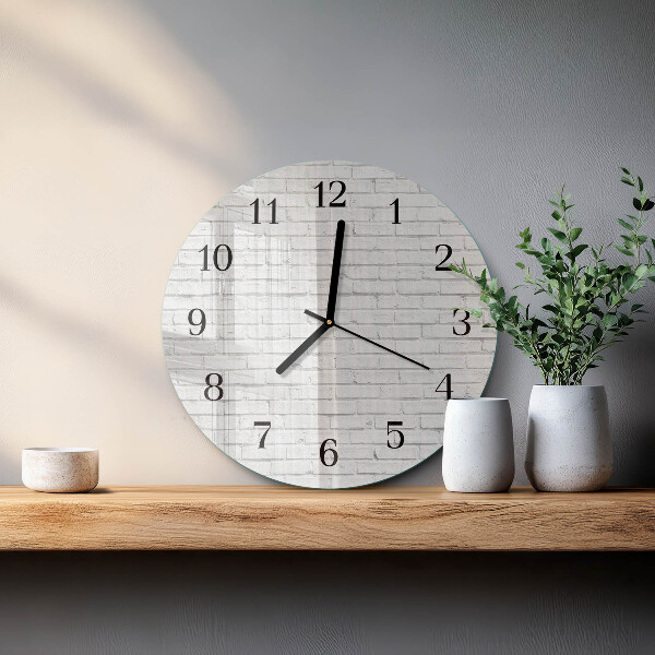 Wanduhr rund Ziegelmauer