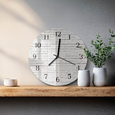 Wanduhr rund Ziegelmauer